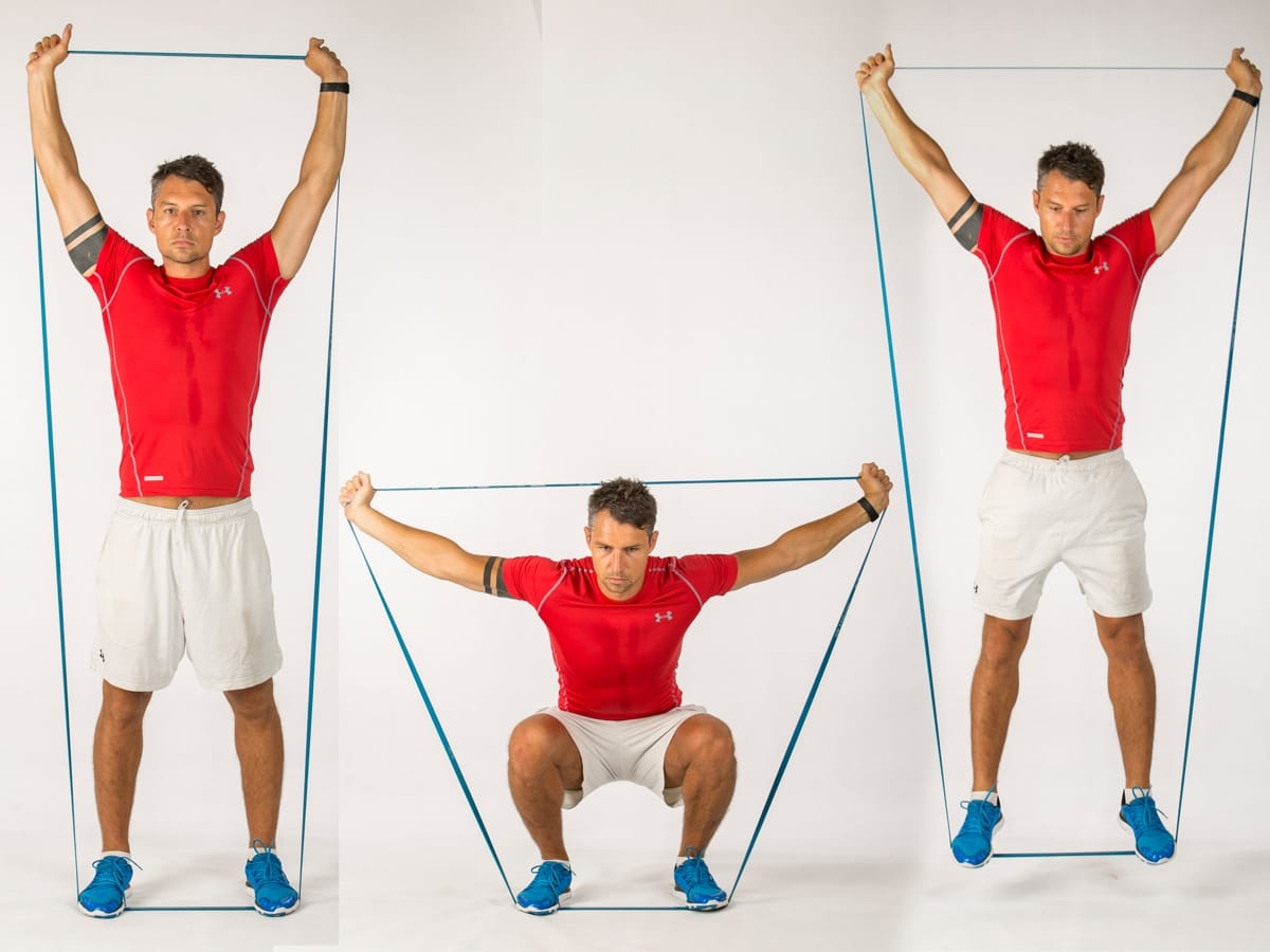 Overhead Extension Band Squat Jump
